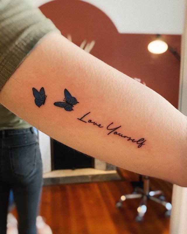tattoo femenino bonita mariposa 23
