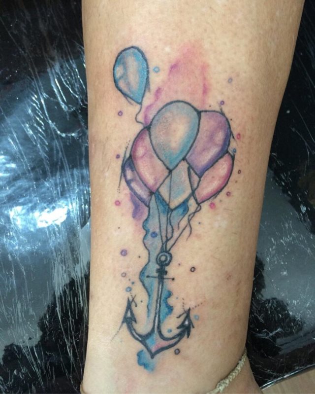 tattoo femenino con un ancla 54