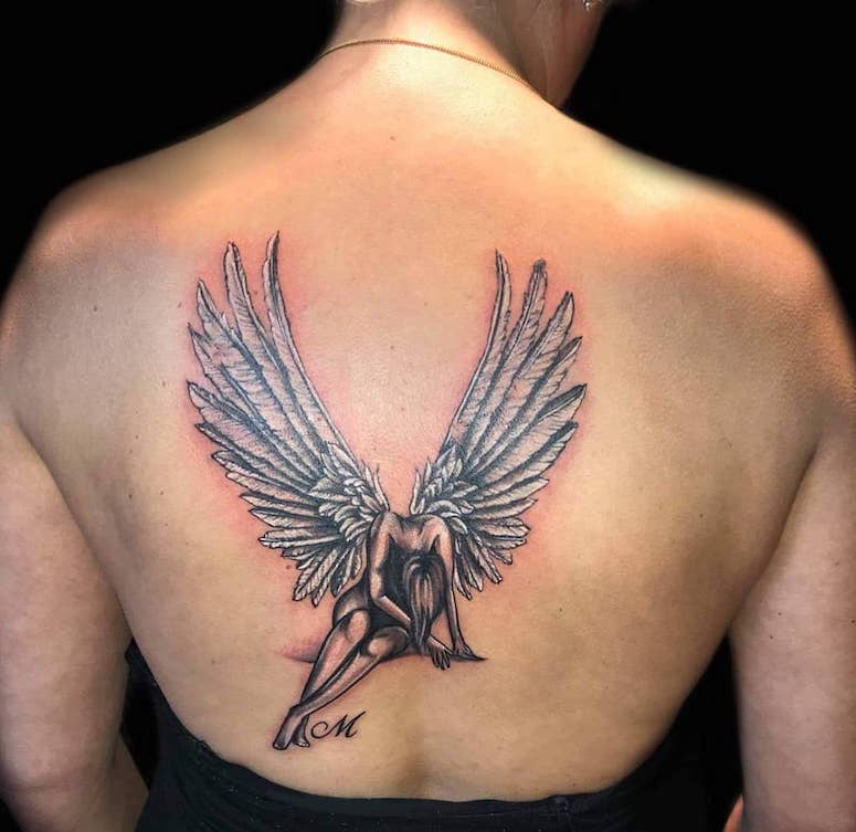 tattoo femenino con un angel 05