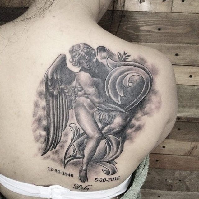 tattoo femenino con un angel 07