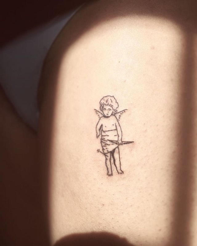 tattoo femenino con un angel 14