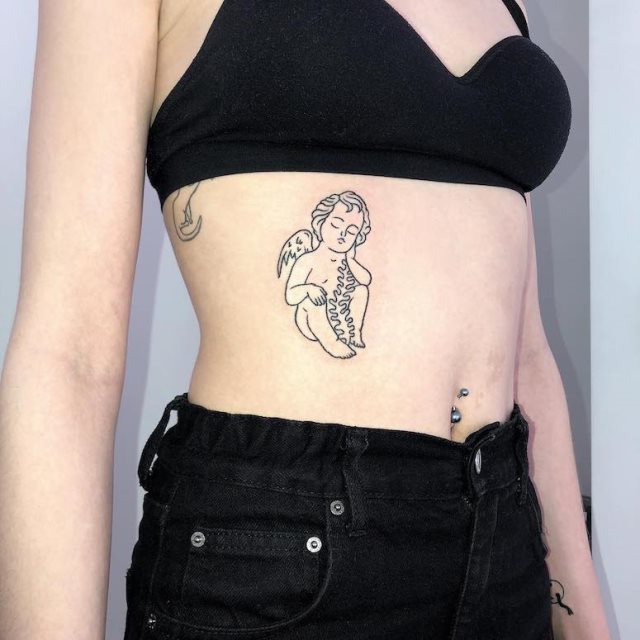 tattoo femenino con un angel 19