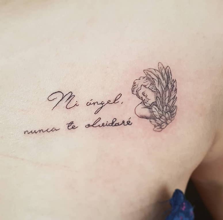 tattoo femenino con un angel 22