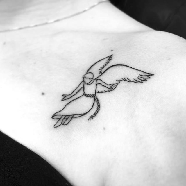 tattoo femenino con un angel 26