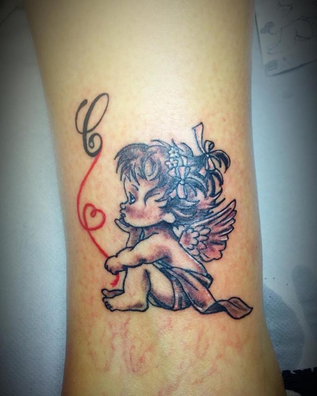 tattoo femenino con un angel 28