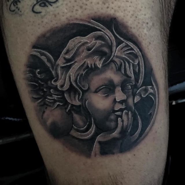 tattoo femenino con un angel 30