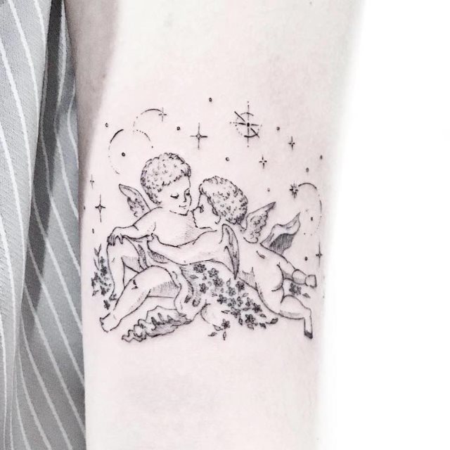 tattoo femenino con un angel 34