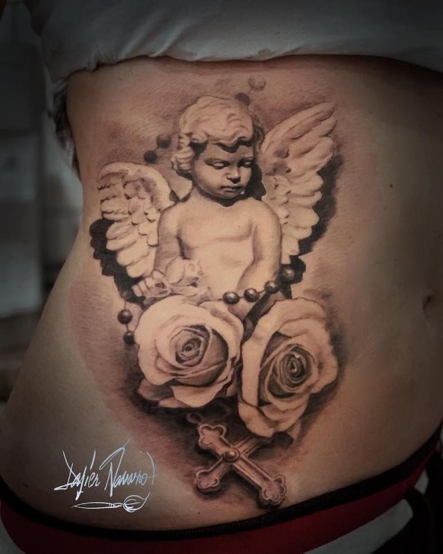 tattoo femenino con un angel 40