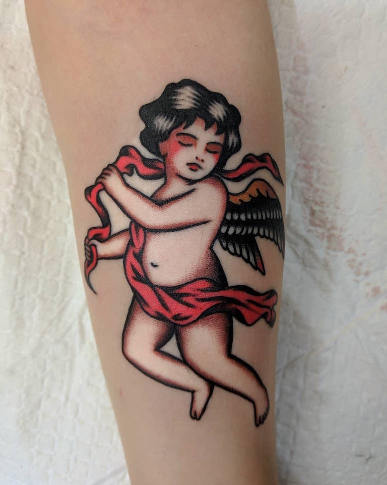 tattoo femenino con un angel 60