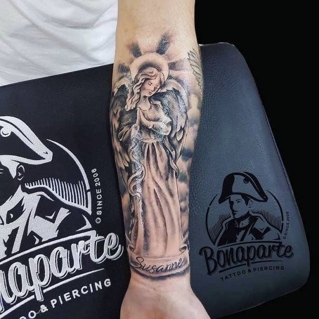 tattoo femenino con un angel 71
