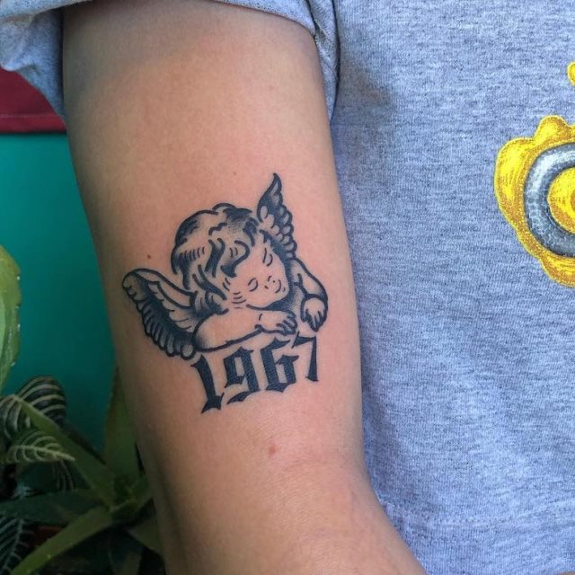 tattoo femenino con un angel 73