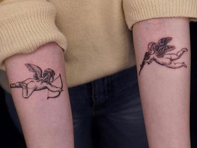 tattoo femenino con un angel 74