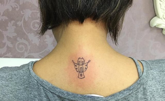 tattoo femenino con un angel 78