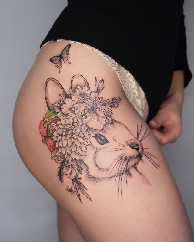 tattoo femenino con un animal 32