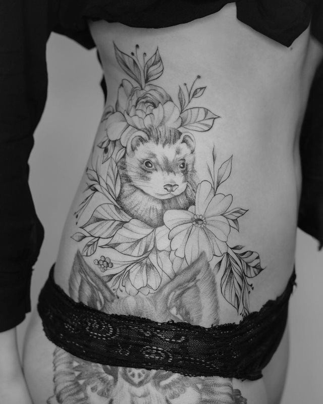 tattoo femenino con un animal 49