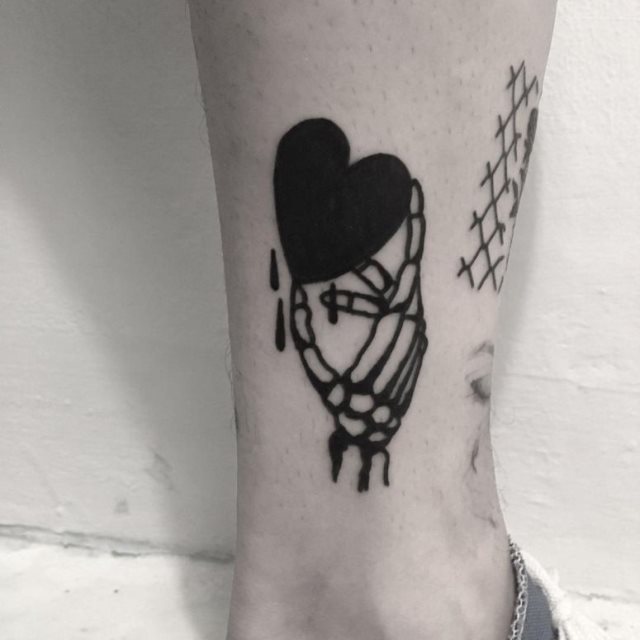 tattoo femenino con un corazon 31