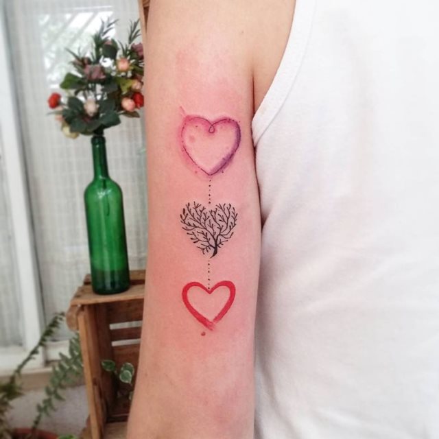 tattoo femenino con un corazon 52