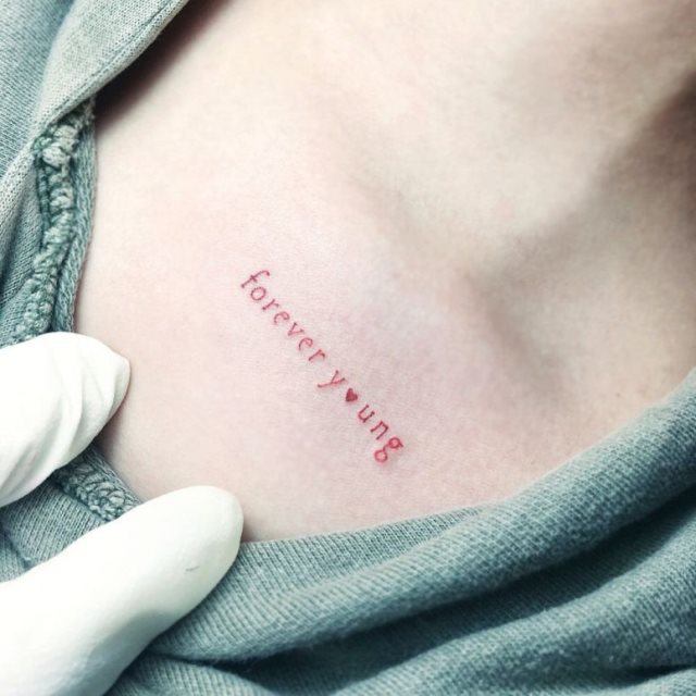tattoo femenino con un corazon 55