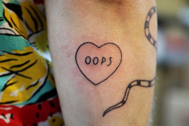 tattoo femenino con un corazon 56