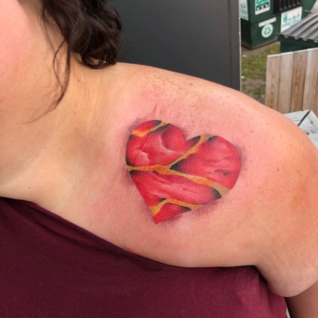 tattoo femenino con un corazon 65