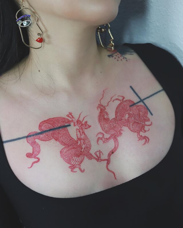 tattoo femenino con un dragon 21