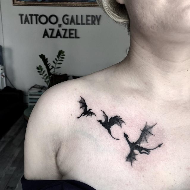 tattoo femenino con un dragon 79