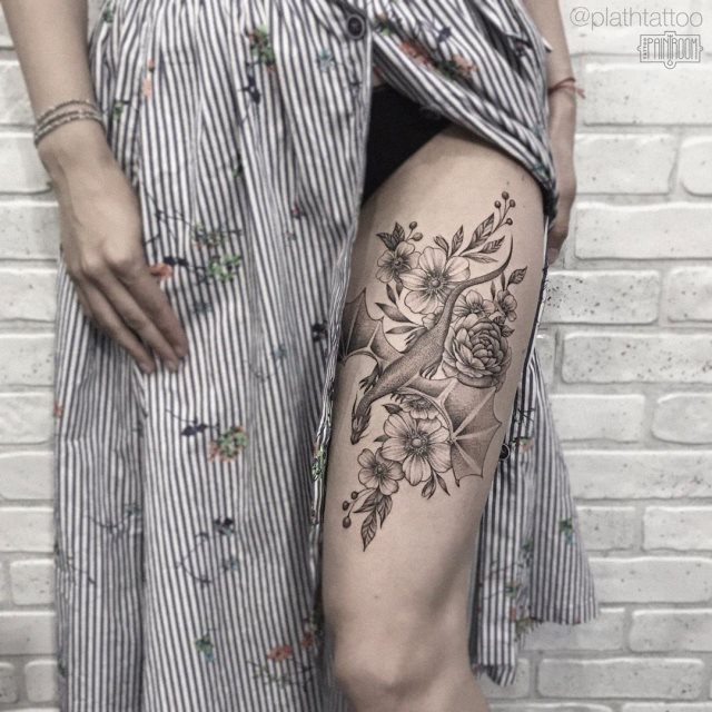 tattoo femenino con un dragon 82