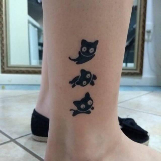 tattoo femenino con un gato 11