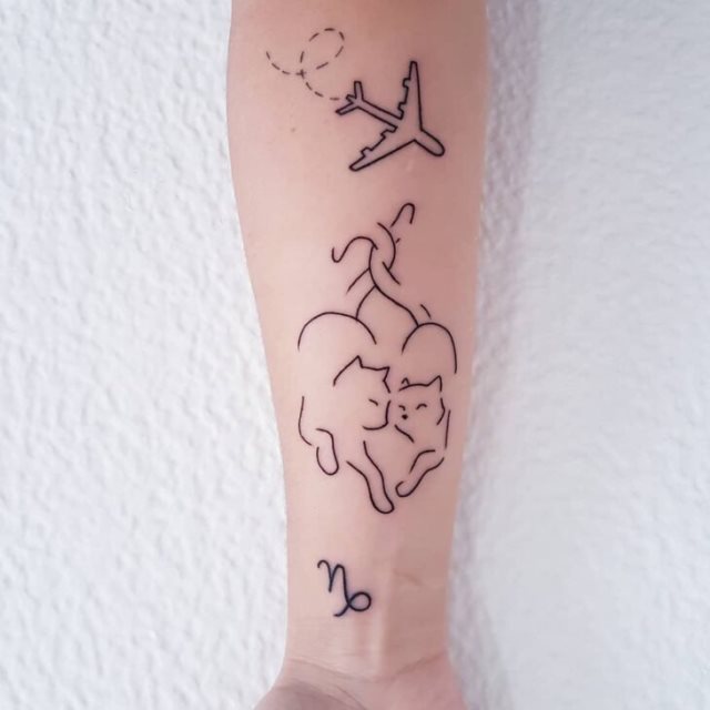 tattoo femenino con un gato 23