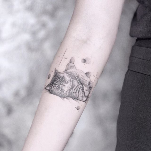 tattoo femenino con un gato 32