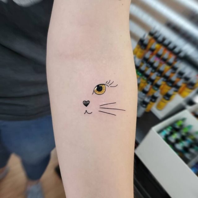 tattoo femenino con un gato 35