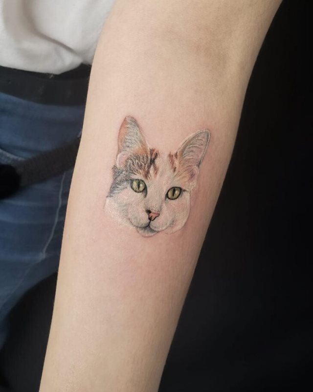 tattoo femenino con un gato 49