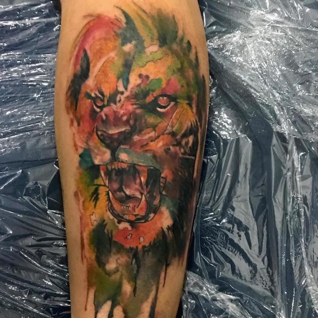 tattoo femenino con un leon 09
