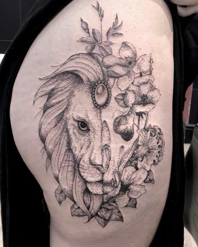 tattoo femenino con un leon 41