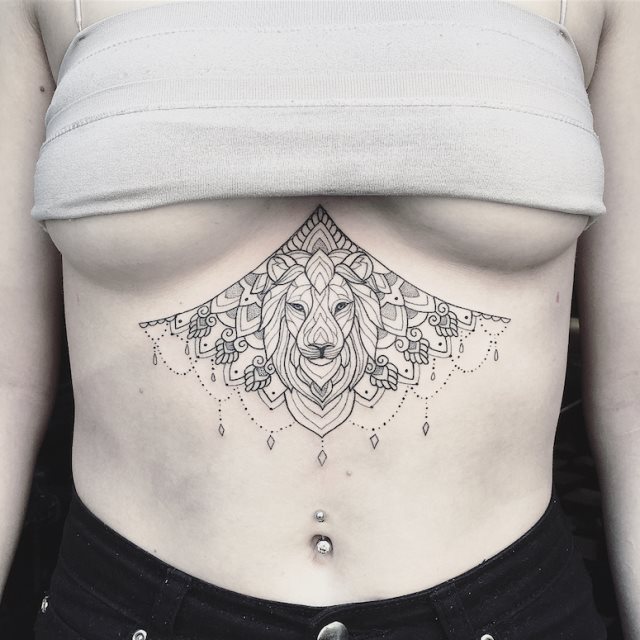 tattoo femenino con un leon 68