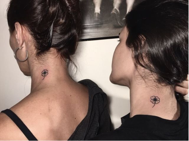 tattoo femenino con un trebol 36