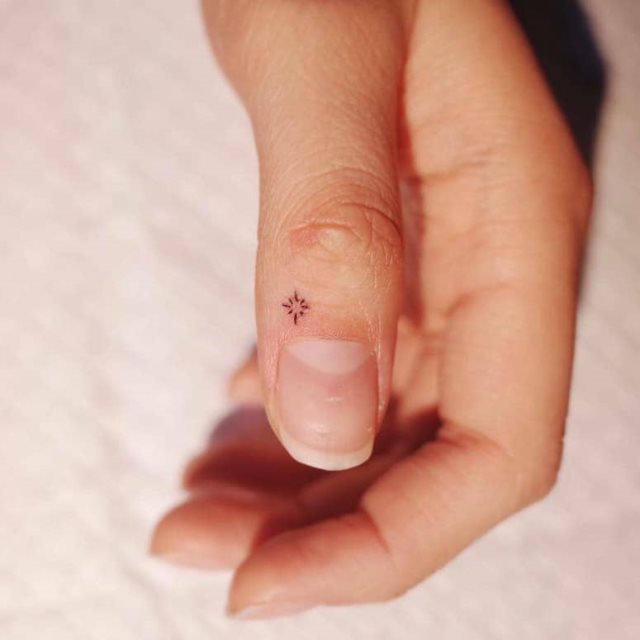 tattoo femenino con una estrella 30