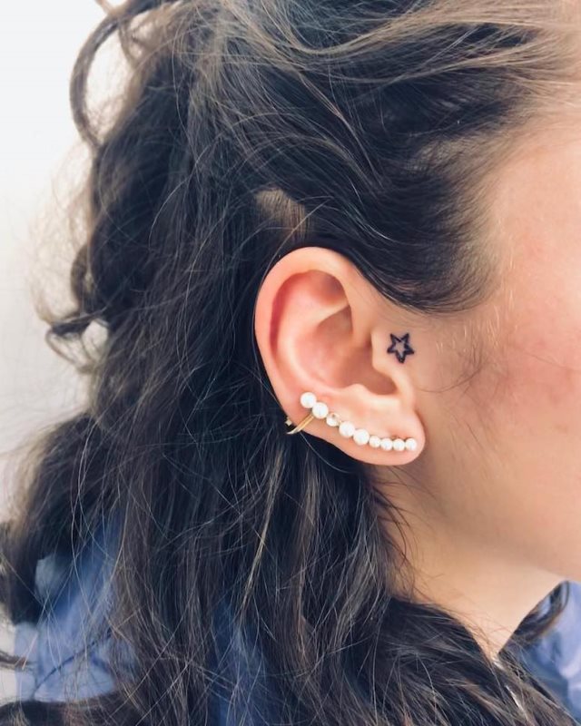 tattoo femenino con una estrella 35