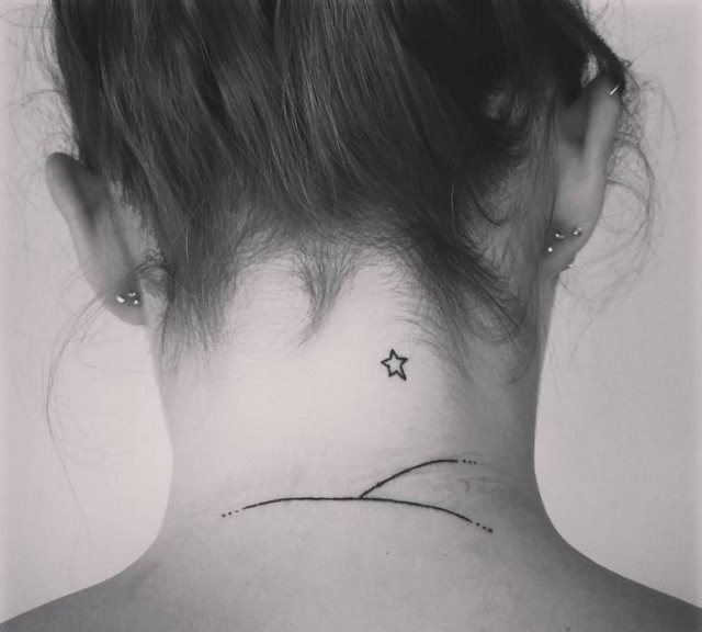 tattoo femenino con una estrella 47