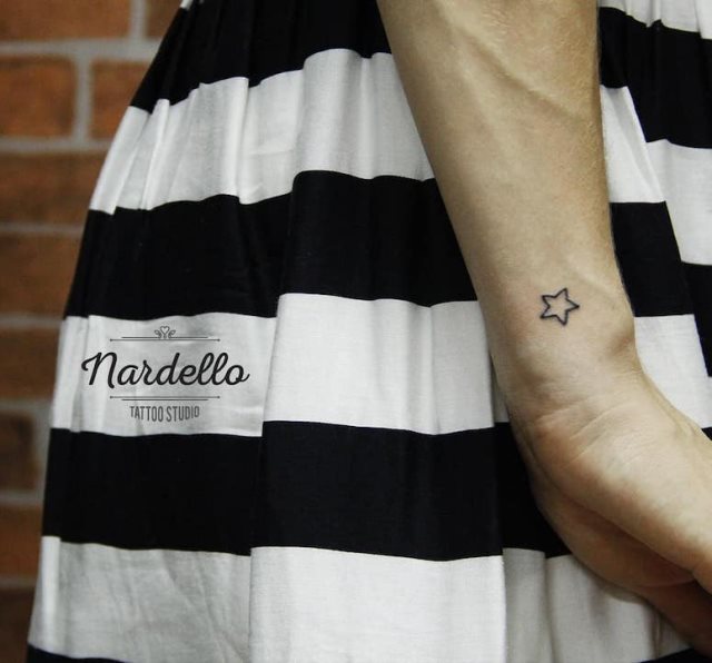 tattoo femenino con una estrella 52
