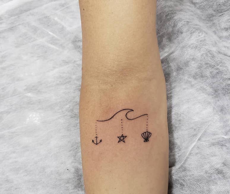 tattoo femenino con una estrella 54