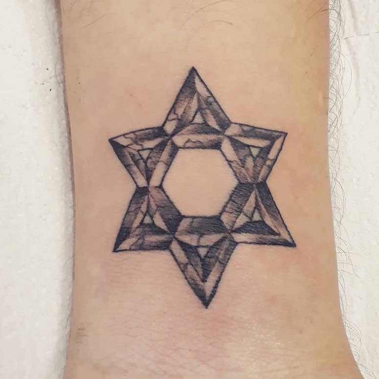 tattoo femenino con una estrella 57