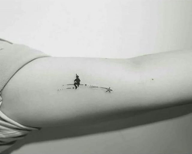 tattoo femenino con una estrella 75