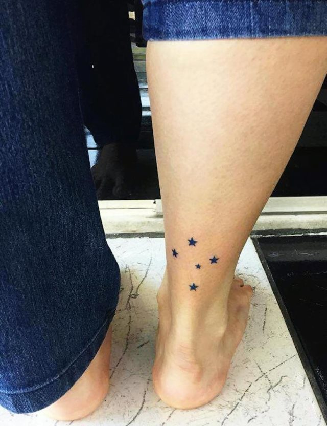 tattoo femenino con una estrella 80