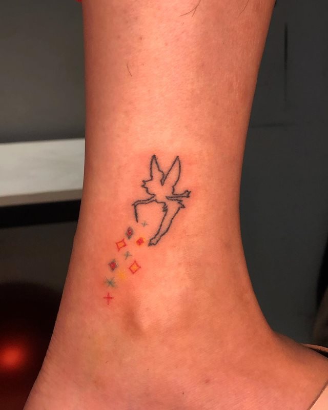 tattoo femenino con una hada 17