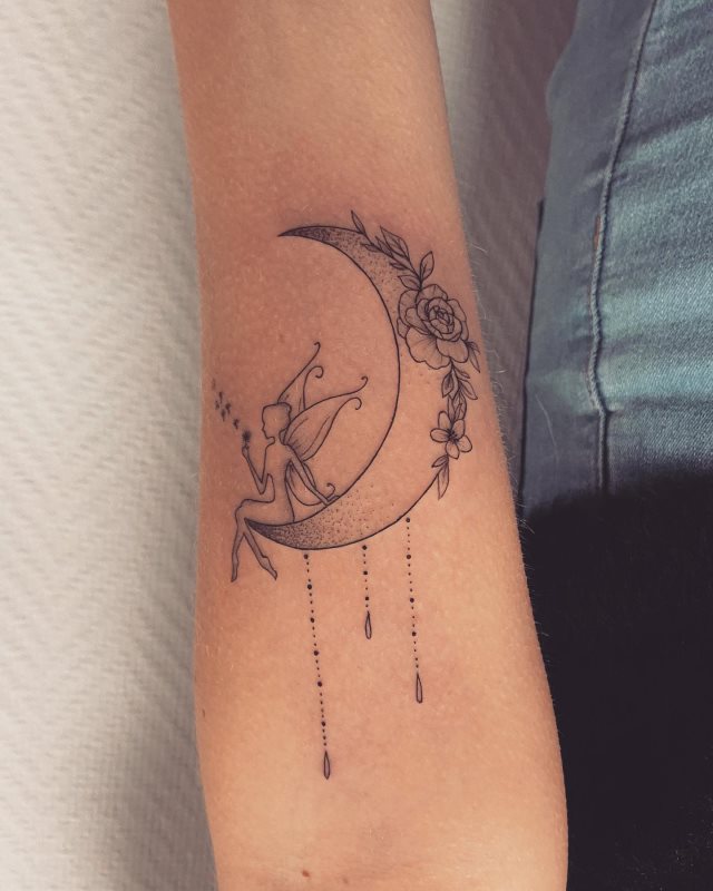tattoo femenino con una hada 34