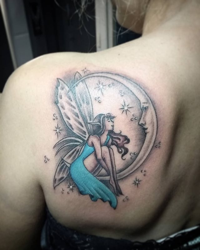 tattoo femenino con una hada 35