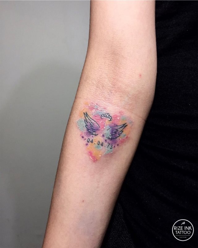 tattoo femenino con unas alas 50