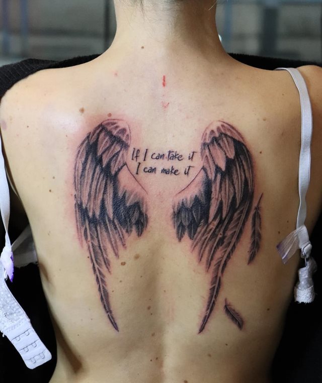 tattoo femenino con unas alas 64