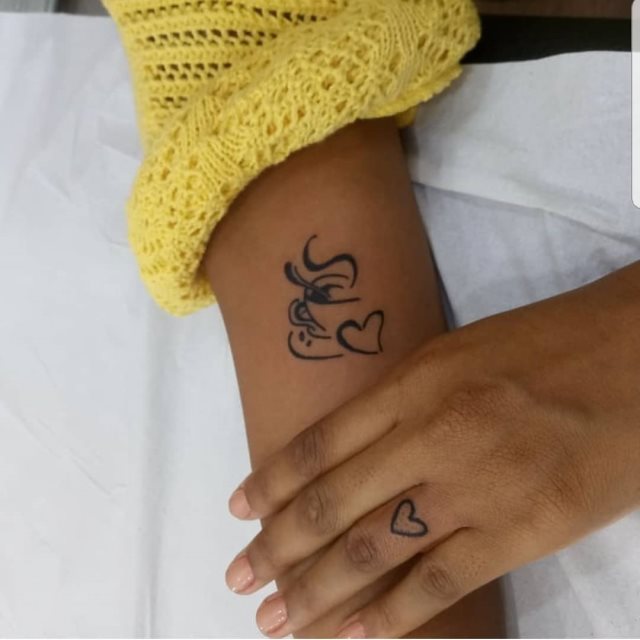 tattoo femenino corazon en un dedo 32